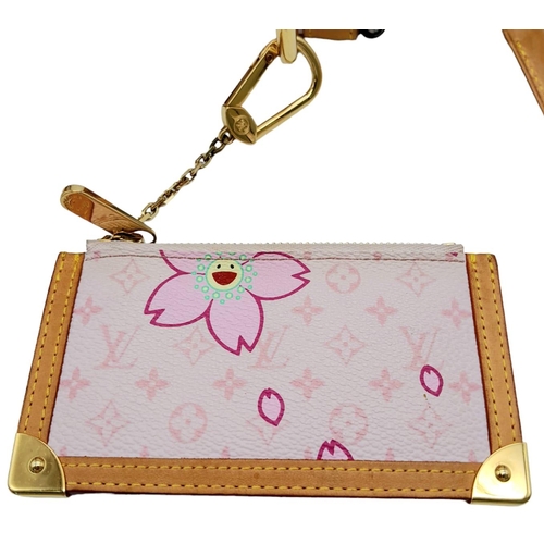 165 - A 2003 Louis Vuitton & Takashi Murakami CoLab Bag.
Monogrammed canvas body with cherry blossom print... 