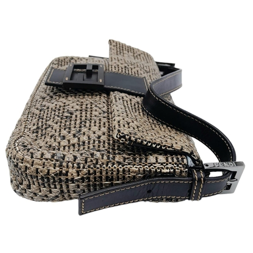 241 - Fendi Woven Baguette Bag.
Quality top handle with silver toned hardware. textured woven material ext... 