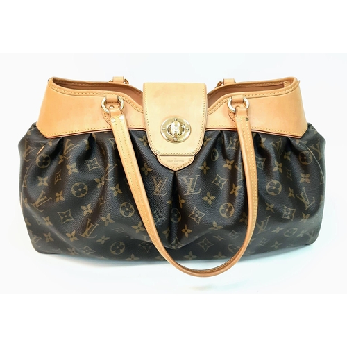 375 - Louise Vuitton Boetie Handbag.
VL Monogrammed pattern, gold tone hardware and quality leather throug... 