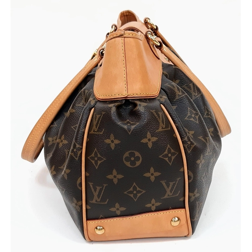 375 - Louise Vuitton Boetie Handbag.
VL Monogrammed pattern, gold tone hardware and quality leather throug... 