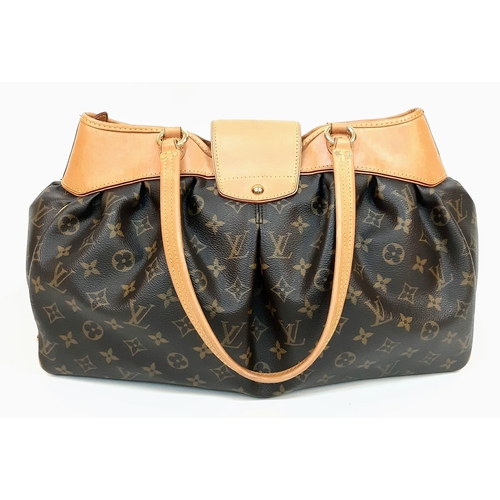 375 - Louise Vuitton Boetie Handbag.
VL Monogrammed pattern, gold tone hardware and quality leather throug... 