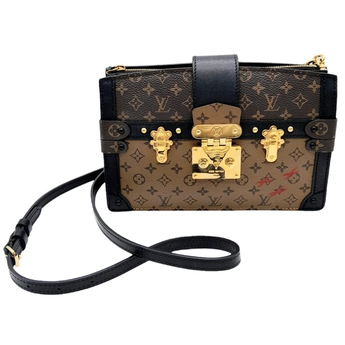 54 - Louis Vuitton Pochette Trunk Crossbody Bag.
Quality leather exterior with LV monogrammed exterior. C... 