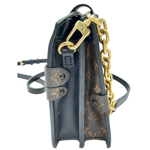 54 - Louis Vuitton Pochette Trunk Crossbody Bag.
Quality leather exterior with LV monogrammed exterior. C... 