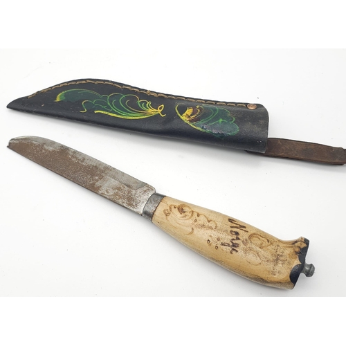 1730 - Three knives; Norwegian decorated knife with carved handle and painted scabbard.
Curved dagger.
Mini... 