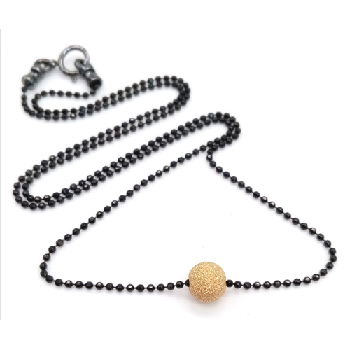 1795 - Black Sterling Silver Necklace with Golden Bead pendant.
40cm in length.
Weight: 2.12g