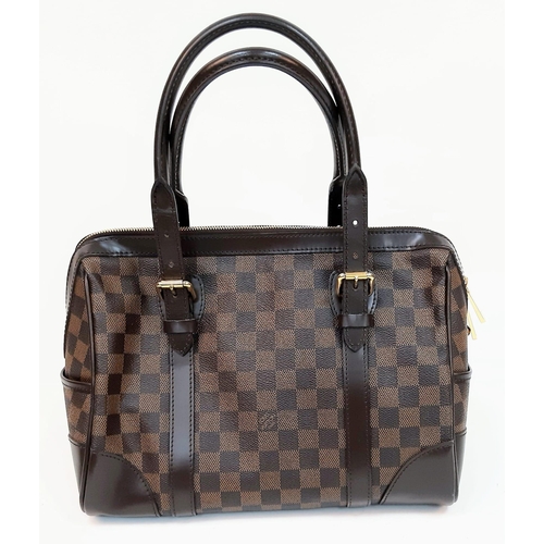 199 - Luis Vuitton Berkeley Bag.
Quality leather with Damier canvas, Damier Ebene pattern. Gold toned hard... 