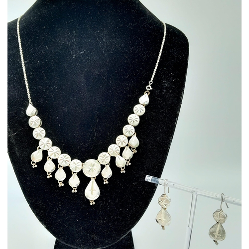 753 - A Unique Vintage or Antique Cased Silver Necklace and Matching Earring Set. 
60cm Length Detailed De... 