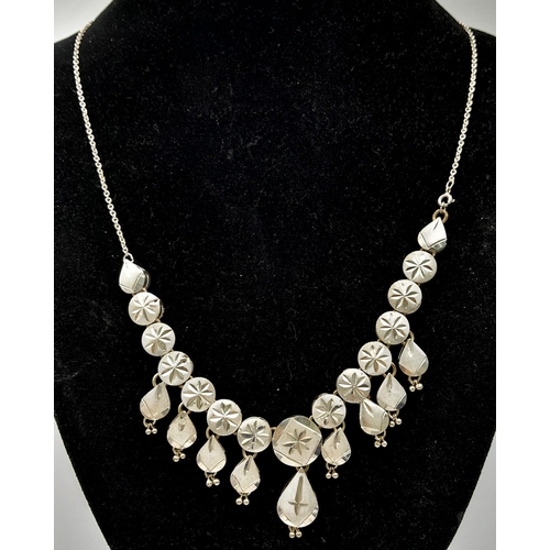 753 - A Unique Vintage or Antique Cased Silver Necklace and Matching Earring Set. 
60cm Length Detailed De... 