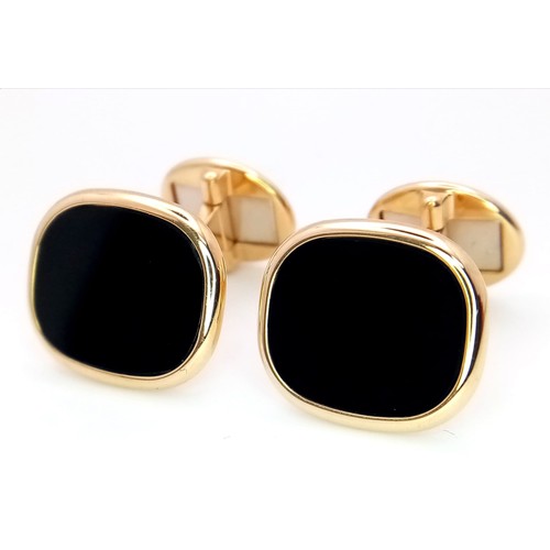 362 - A Pair of Classic Patek Philippe 18K Yellow Gold and Onyx Cufflinks. 14.65g total weight.