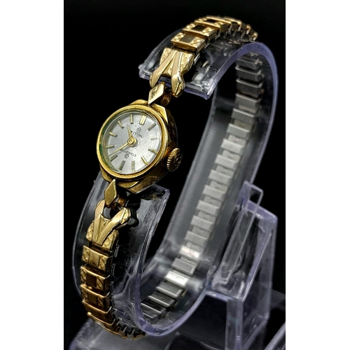 938 - A Vintage 21 Jewel Titoni Ladies Watch. Expandable gilded strap. Two tone (rolled gold) case - 15mm.... 