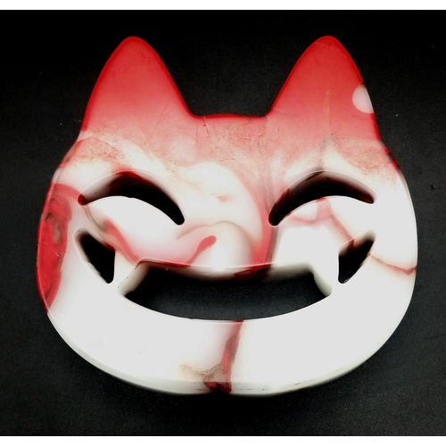 1759 - A Hand-Carved Natural Flame Agate Smiling Cheshire Cat Face. Ornament or paperweight. 8cm x 8cm.