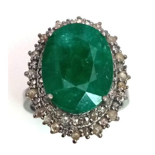 1396 - A 6.10ct Emerald Gemstone Ring with 1ct of Diamond Halos. Set in 925 silver. Size N. Comes with a GL... 