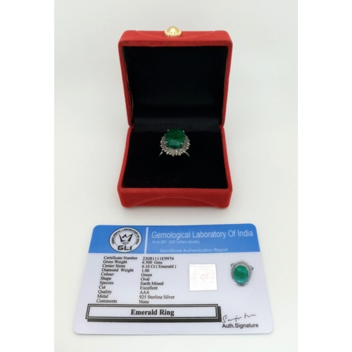 1396 - A 6.10ct Emerald Gemstone Ring with 1ct of Diamond Halos. Set in 925 silver. Size N. Comes with a GL... 