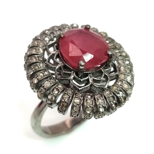 1745 - An Art Deco Style 5.90ct Ruby Ring with 1.60ct of Diamond Accents. Set in 925 silver. Size P. Comes ... 