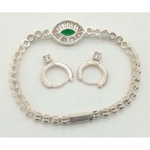 805 - A 925 Silver with Zircons Tennis Bracelet and Hoop Earring Set.