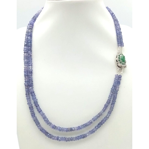 1078 - A Two Row Tanzanite Gemstone Necklace with an Emerald and 925 Silver Clasp. 45cm in length, 175ctw t... 