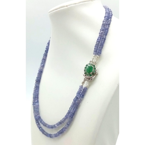 1078 - A Two Row Tanzanite Gemstone Necklace with an Emerald and 925 Silver Clasp. 45cm in length, 175ctw t... 