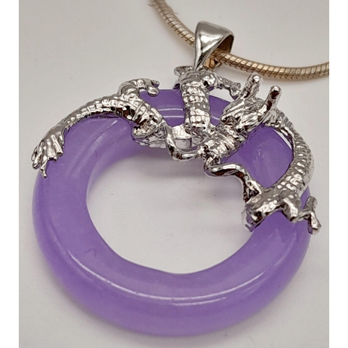 1603 - A Lavender Jade Pendant on a 925 Silver Chain. 3cm and 42cm.