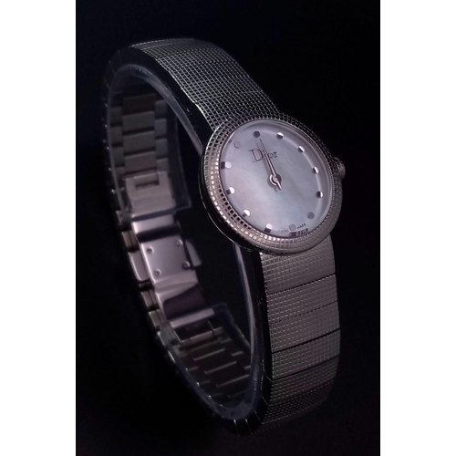 1255 - A Designer Christian Dior Quartz Ladies Watch. Stainless steel bracelet and case - 23mm. White dial.... 