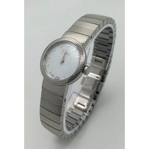 1255 - A Designer Christian Dior Quartz Ladies Watch. Stainless steel bracelet and case - 23mm. White dial.... 