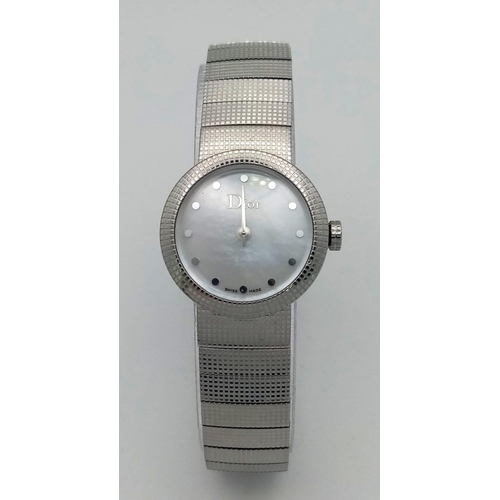 1255 - A Designer Christian Dior Quartz Ladies Watch. Stainless steel bracelet and case - 23mm. White dial.... 