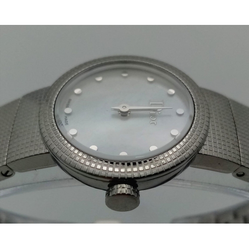 1255 - A Designer Christian Dior Quartz Ladies Watch. Stainless steel bracelet and case - 23mm. White dial.... 