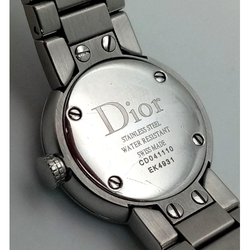 1255 - A Designer Christian Dior Quartz Ladies Watch. Stainless steel bracelet and case - 23mm. White dial.... 