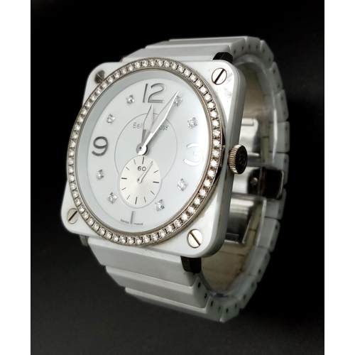 1345 - A Bell and Ross Quartz Ladies Watch. Ceramic and stainless steel bracelet and case - 40mm. White dia... 