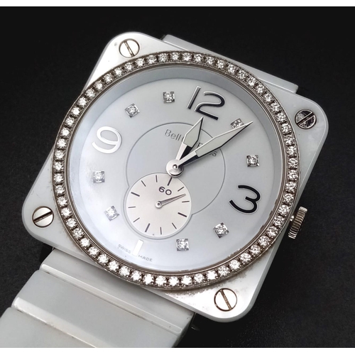 1345 - A Bell and Ross Quartz Ladies Watch. Ceramic and stainless steel bracelet and case - 40mm. White dia... 