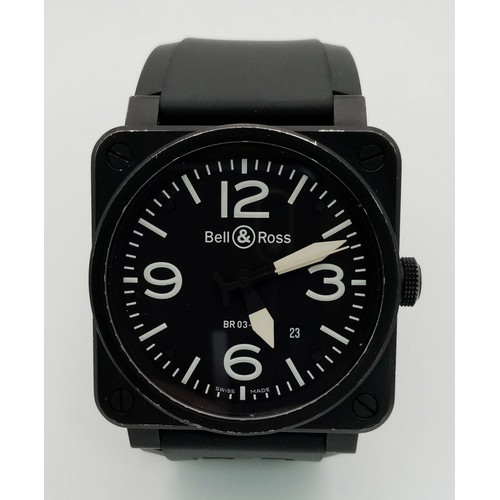 1688 - A Bell and Ross Aviation Type/Military Spec Gents Watch. Black rubber strap. Black stainless steel c... 