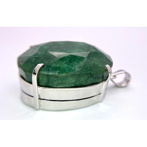 1041 - A 275ct Oval Shape Emerald Pendant! Set in 925 Silver. 65g total weight. Comes with a presentation c... 