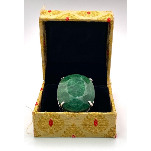 1041 - A 275ct Oval Shape Emerald Pendant! Set in 925 Silver. 65g total weight. Comes with a presentation c... 