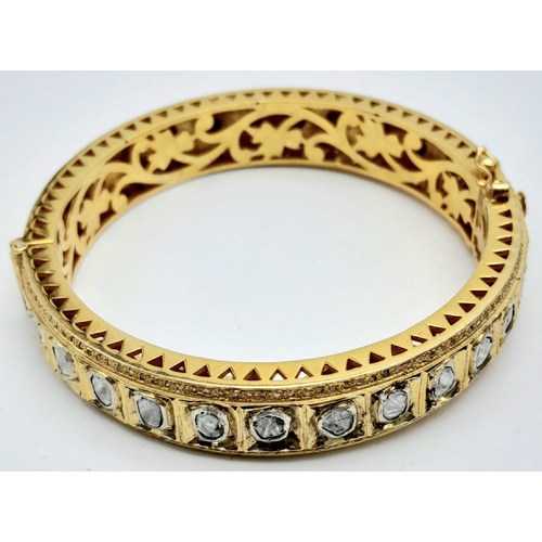 105 - A very glamorous, vintage, bangle with large Natural Untreated diamonds (total 5.60 carats appr.), s... 