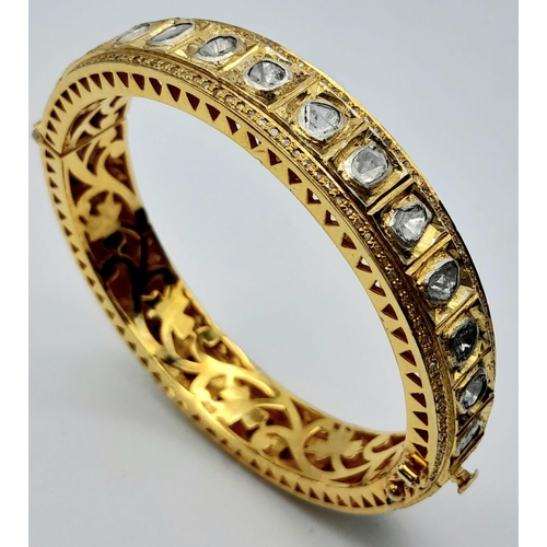 105 - A very glamorous, vintage, bangle with large Natural Untreated diamonds (total 5.60 carats appr.), s... 