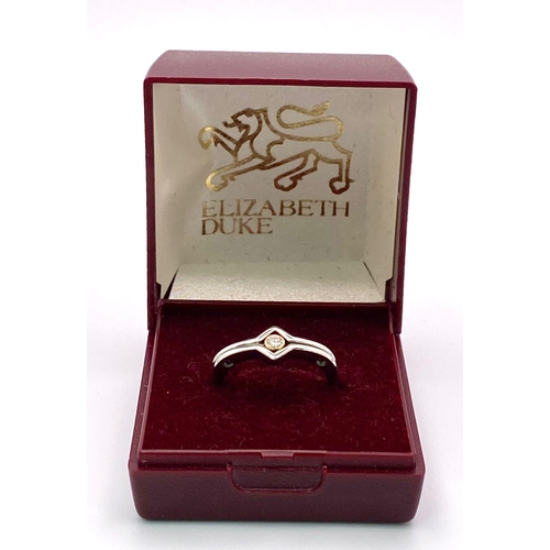 106 - A 950 Platinum, Diamond Solitaire Ring. Size M. 6g total weight.