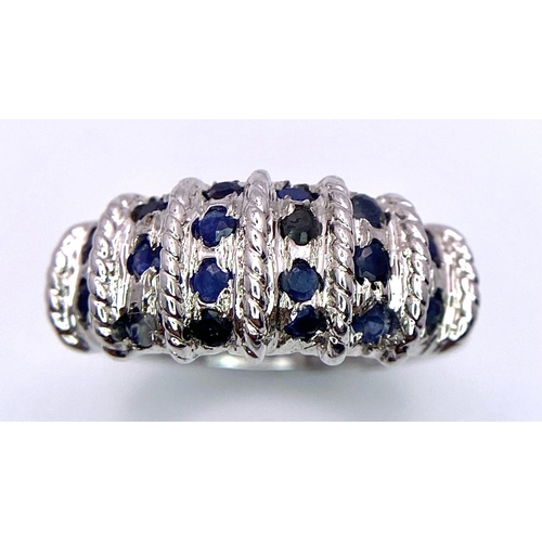 1340 - A Graduating Vertical Band Sapphire 925 Silver Ring. Sapphires - 2ctw. 4.77g total weight. Size M. C... 