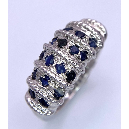 1340 - A Graduating Vertical Band Sapphire 925 Silver Ring. Sapphires - 2ctw. 4.77g total weight. Size M. C... 