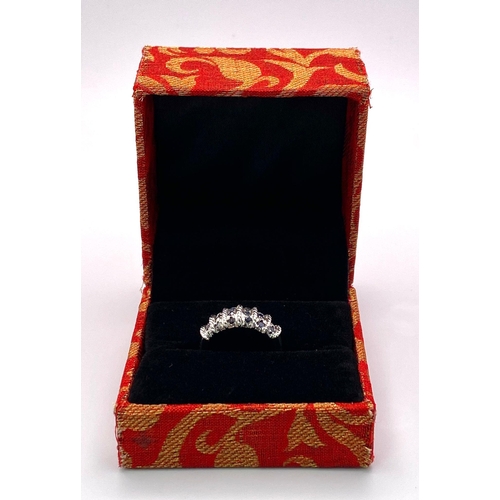 1340 - A Graduating Vertical Band Sapphire 925 Silver Ring. Sapphires - 2ctw. 4.77g total weight. Size M. C... 