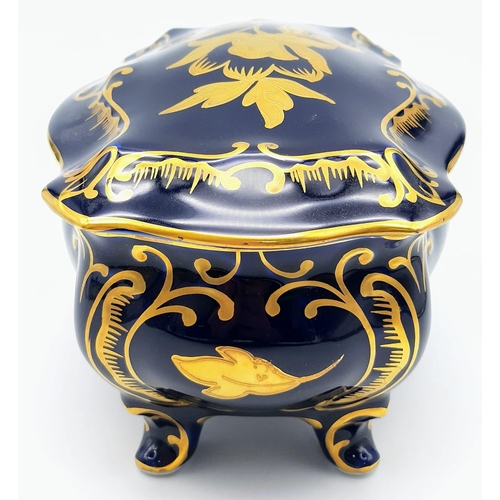 1351 - A NICELY DECORATED KOBALT TRINKET BOX. 17 X 10cms and 12cms in height