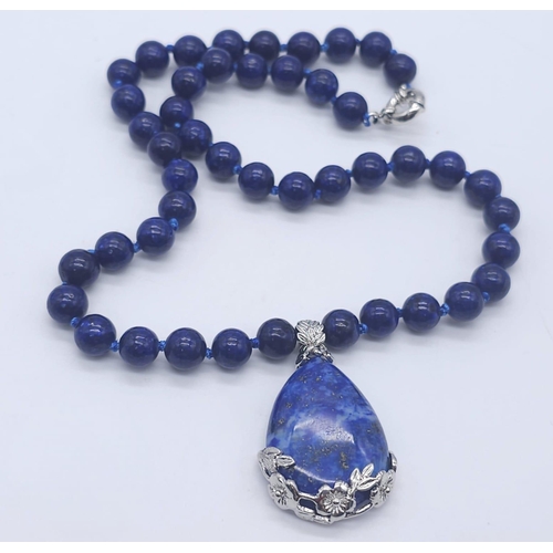 1575 - A Lapis Lazuli Suite Comprising of Necklace with Drop Pendant - 42cm and 4cm. Decorative oval lapis ... 