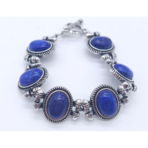 1575 - A Lapis Lazuli Suite Comprising of Necklace with Drop Pendant - 42cm and 4cm. Decorative oval lapis ... 