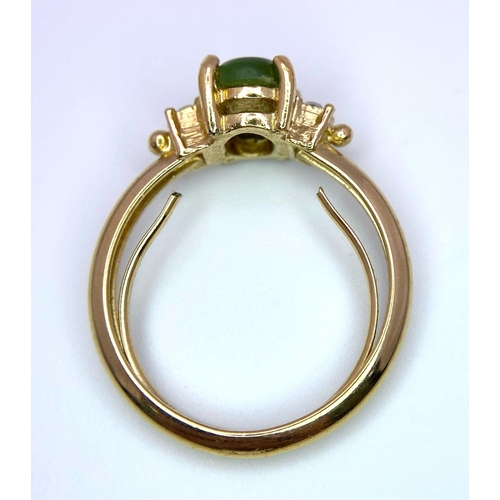 1584 - A Vintage 9K Yellow Gold Jade and White Stone Ring. Small central jade cabochon. Size N. 2.31g total... 