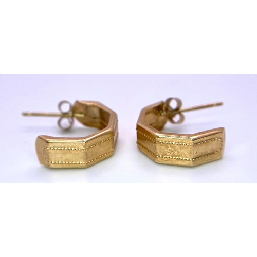 1705 - A Pair of 9K Yellow Gold Half-Hoop Earrings. 0.68g total weight.