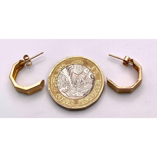 1705 - A Pair of 9K Yellow Gold Half-Hoop Earrings. 0.68g total weight.