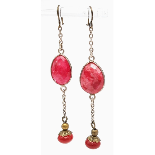 1747 - A Pair of Two Tier Ruby Drop Earrings. 6cm drop.