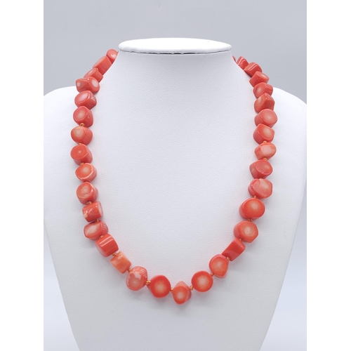 1769 - A Red Coral Chunky Necklace and Earring Set. Necklace - 44cm. Earrings - 15mm diameter.