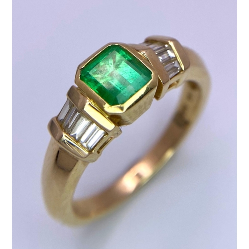 236 - A fabulous 14K Yellow Gold Ring with a stunning Cushion-Cut Emerald flanked by baguette Diamonds.
Co... 