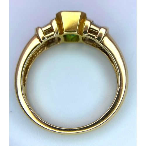 236 - A fabulous 14K Yellow Gold Ring with a stunning Cushion-Cut Emerald flanked by baguette Diamonds.
Co... 