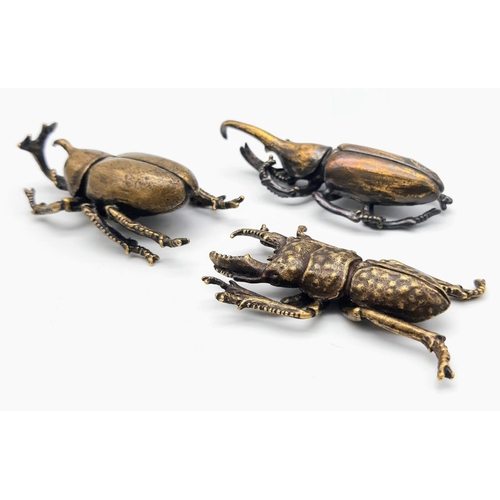 238 - Three Japanese, highly detailed, bronze beetles representing. Virility, Longevity and Rejuvenation. ... 