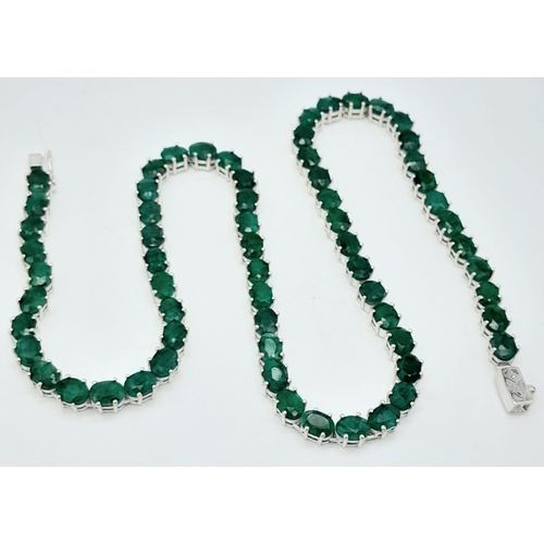 34 - An Emerald Gemstone Tennis Necklace set in 925 Silver. 47cm length. 40g total weight.